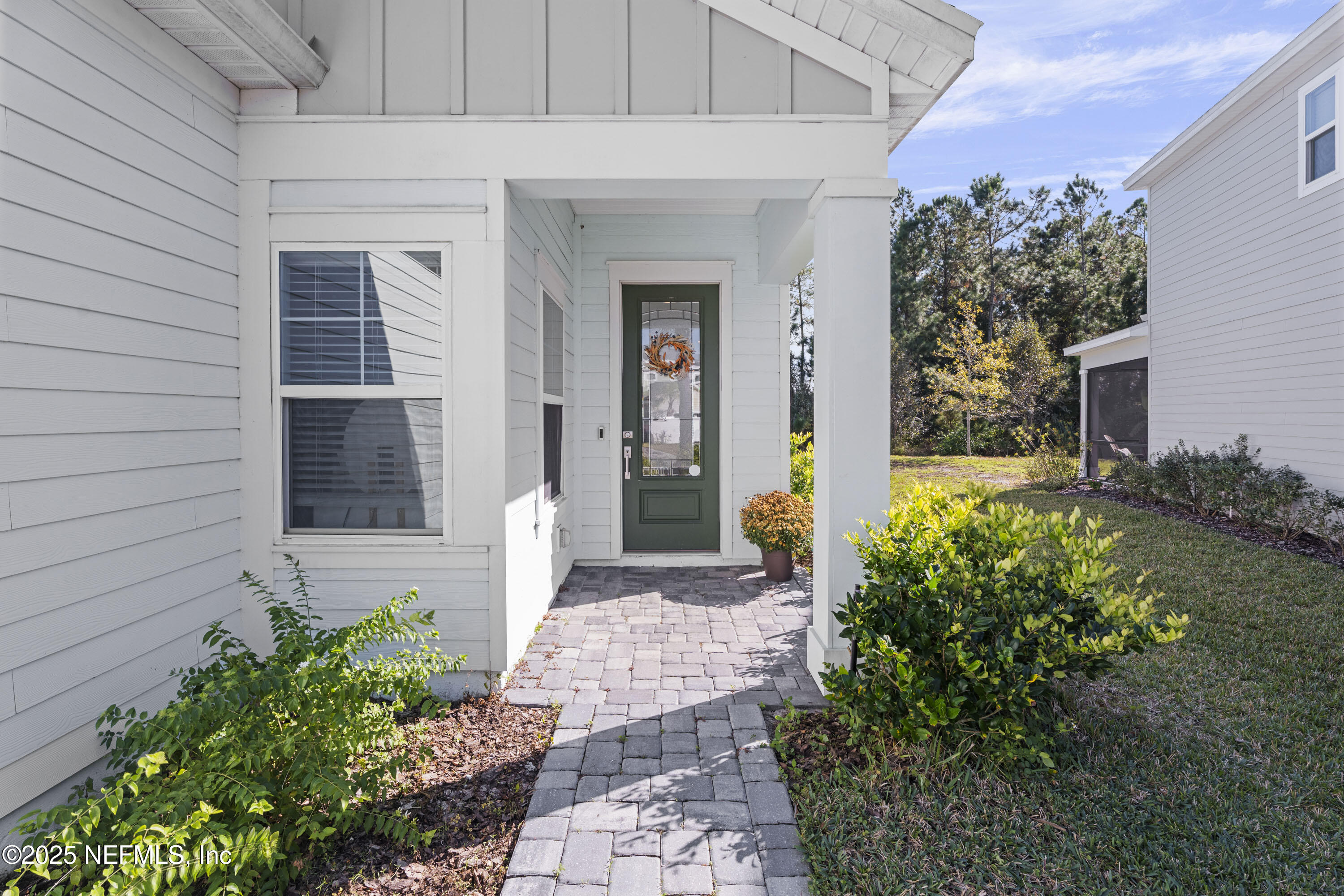 165 Killarney Avenue St. Johns, FL 32259 - Photo 4 of 63 a front view of a house with a yard