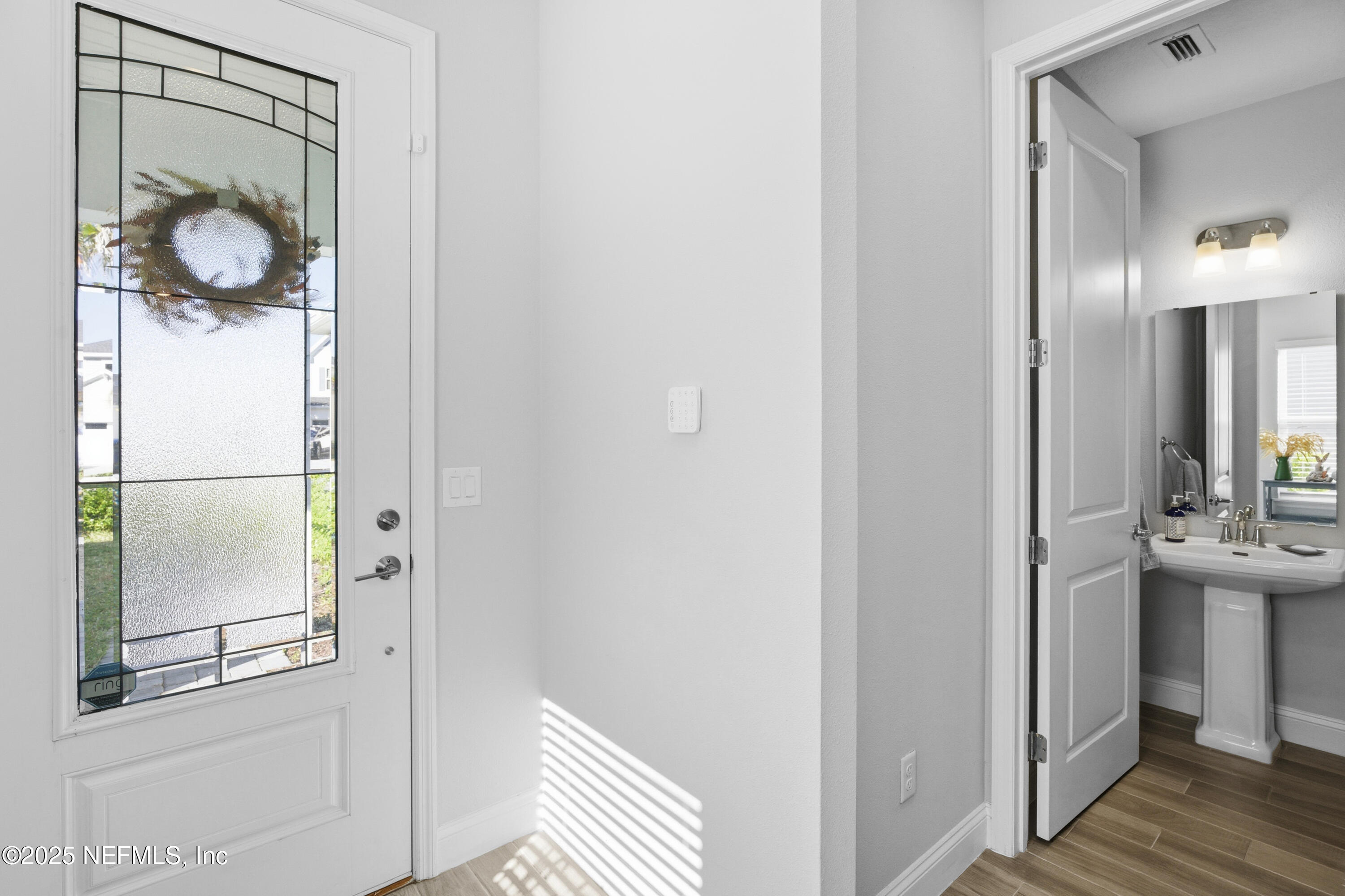 165 Killarney Avenue St. Johns, FL 32259 - Photo 6 of 63 a view of a bathroom from a hallway