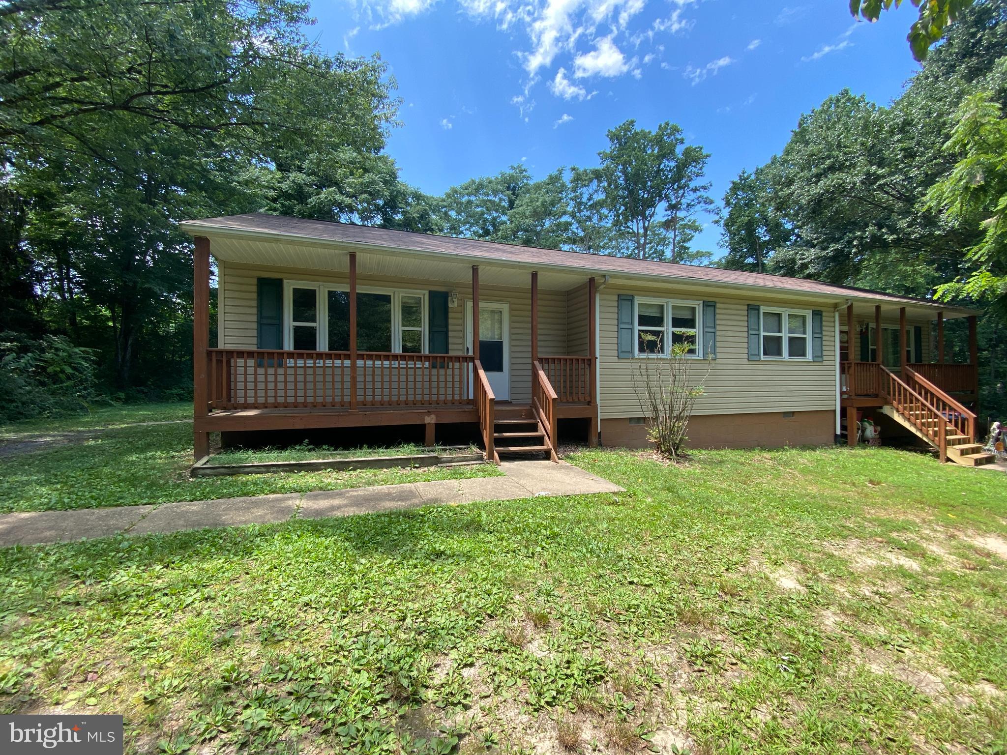 8444 Indiantown Road King George, VA 22485 - Photo 1 of 22 a view of a house with a yard and furniture