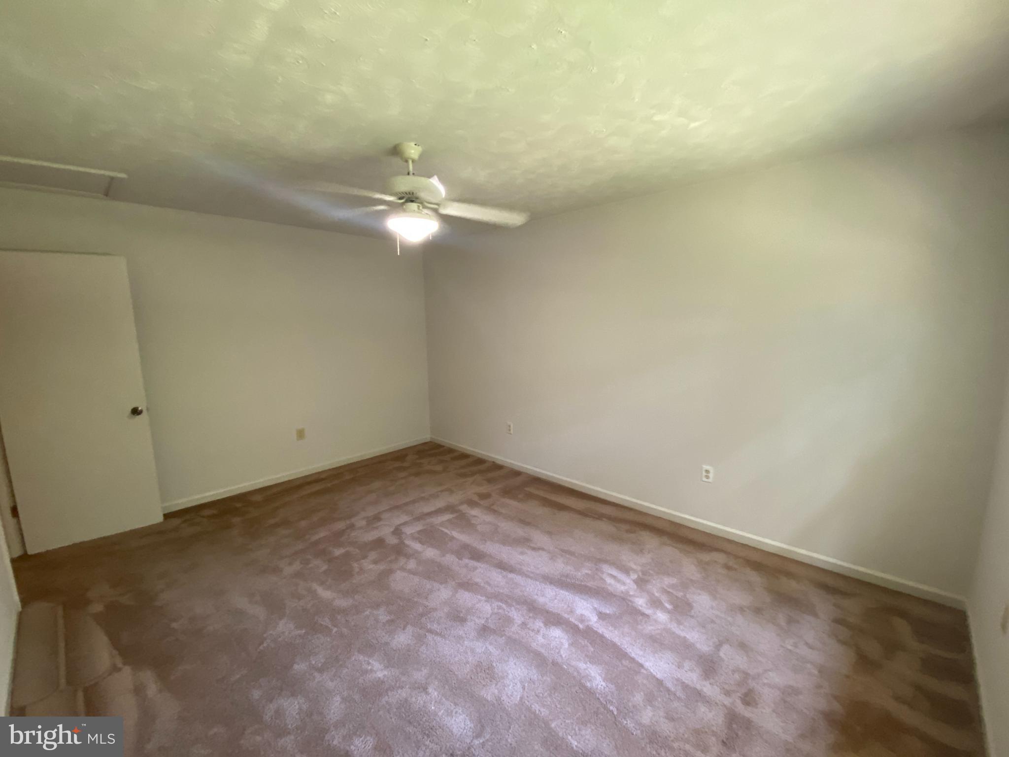 8444 Indiantown Road King George, VA 22485 - Photo 17 of 22 a view of a big room with carpet