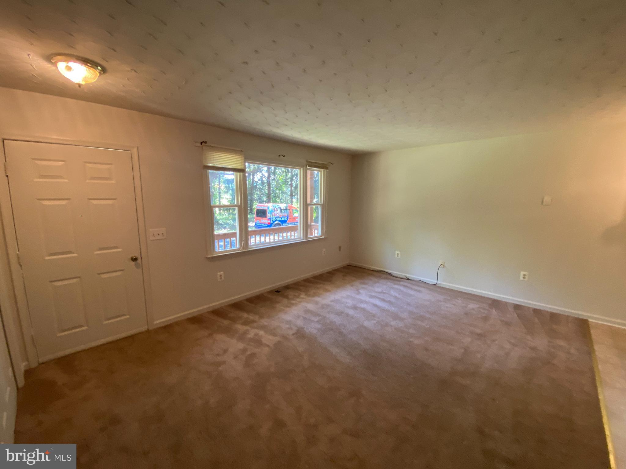 8444 Indiantown Road King George, VA 22485 - Photo 4 of 22 an empty room with windows