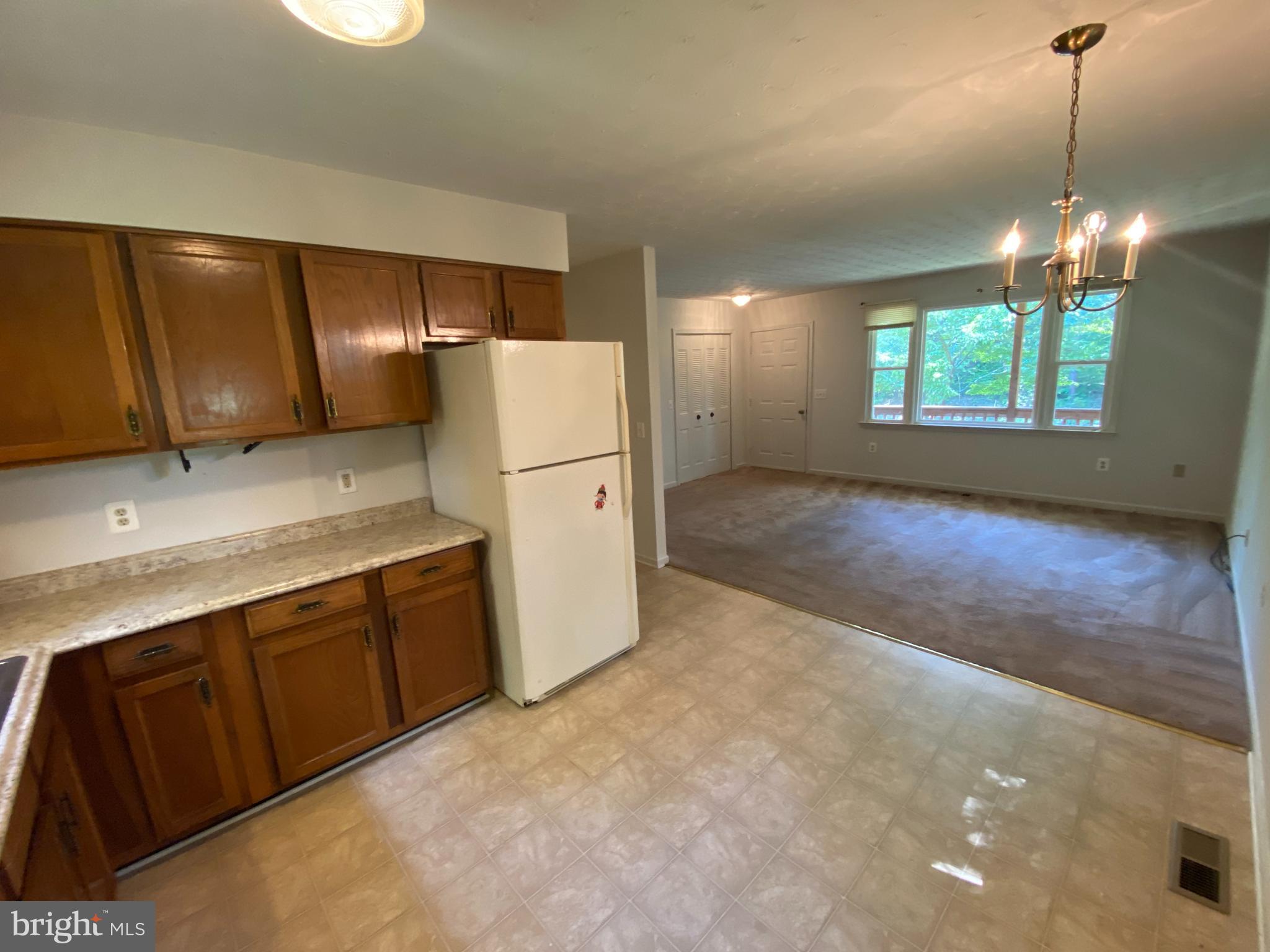 8444 Indiantown Road King George, VA 22485 - Photo 7 of 22 a kitchen with a refrigerator a sink and dishwasher