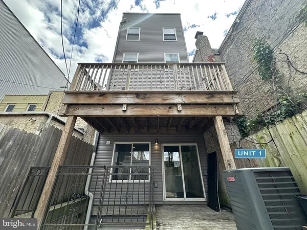 a view of a balcony with door