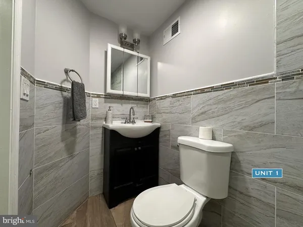 a bathroom with a sink and a toilet