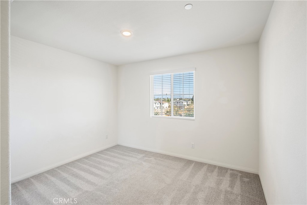 9605 Bonsai Lane Riverside, CA 92508 - Photo 14 of 30 an empty room with windows