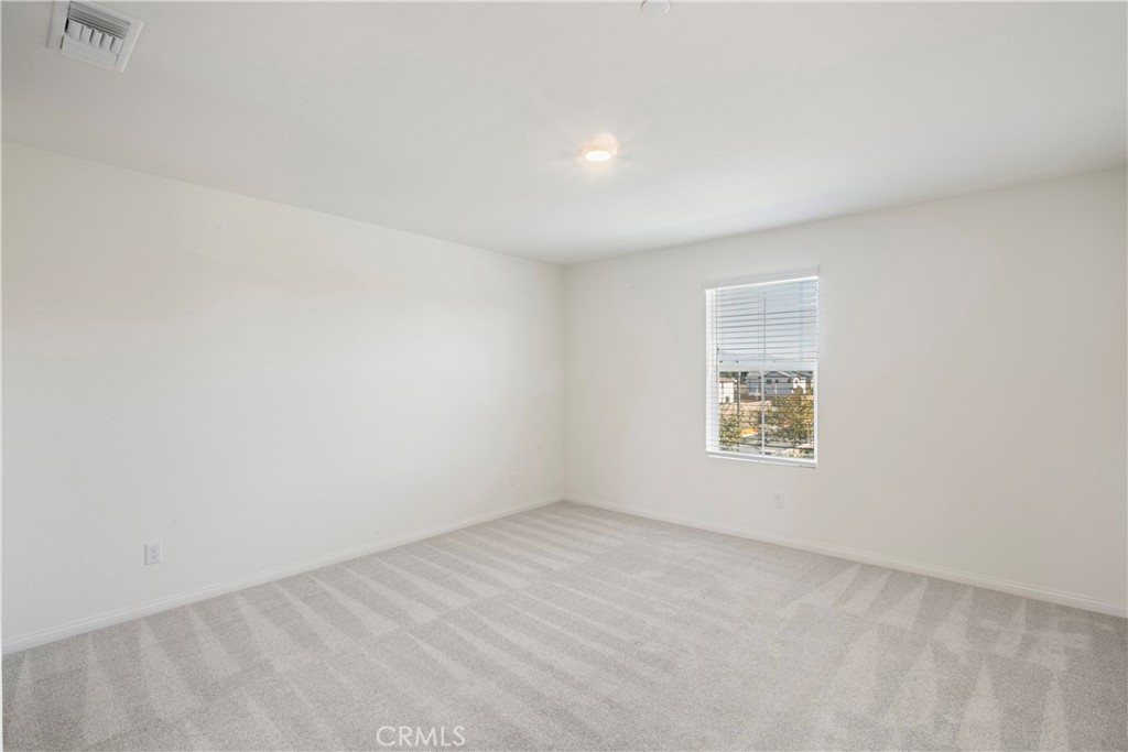 9605 Bonsai Lane Riverside, CA 92508 - Photo 24 of 30 an empty room with a window