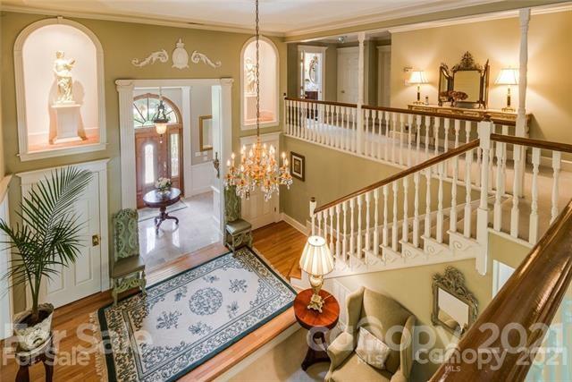 2932 High Ridge Road Charlotte, NC 28270 - Photo 17 of 26 workspace with wooden floor windows and a livingroom