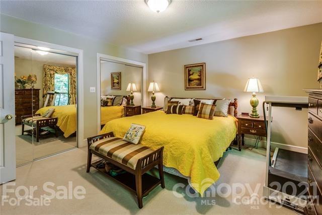2932 High Ridge Road Charlotte, NC 28270 - Photo 19 of 26 a bed room with a bed and a chair