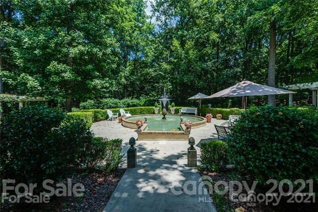 2932 High Ridge Road Charlotte, NC 28270 - Photo 23 of 26 a view of yard with green space and seating area