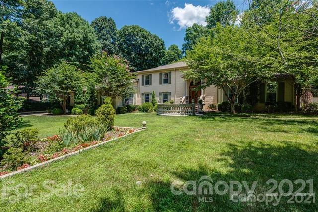 2932 High Ridge Road Charlotte, NC 28270 - Photo 25 of 26 a view of a house with backyard and sitting area