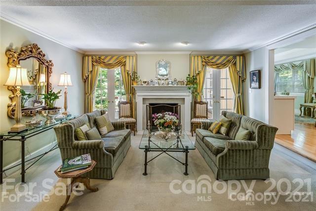 2932 High Ridge Road Charlotte, NC 28270 - Photo 10 of 26 a living room with furniture and a fireplace