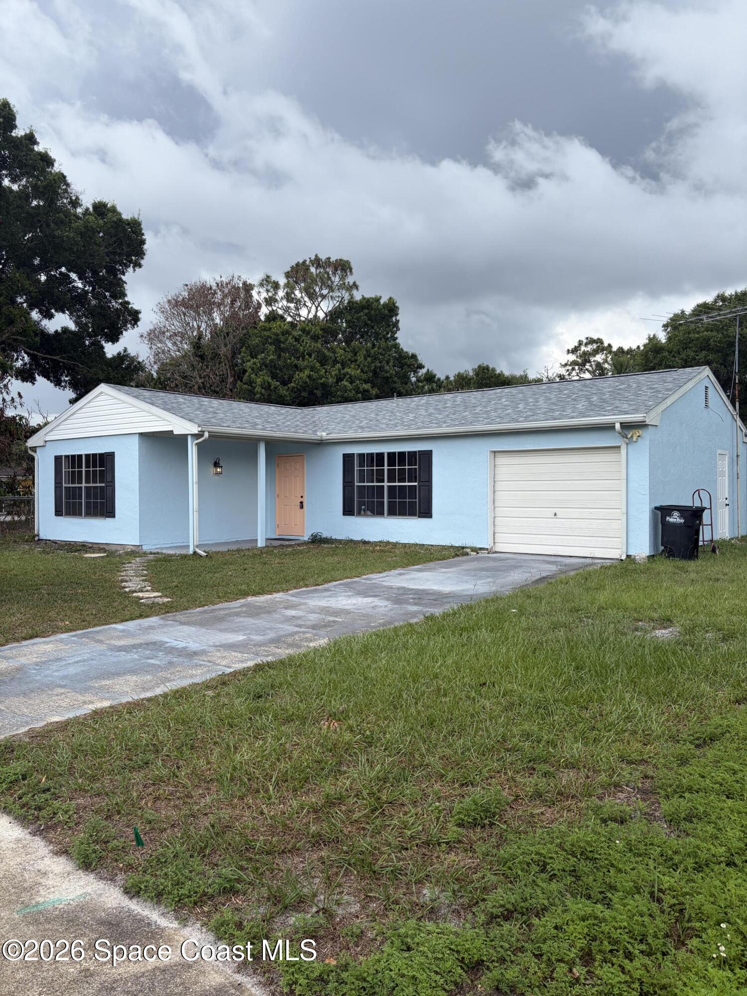 1136 Minnet Court Northeast Palm Bay, FL 32905 - Photo 2 of 31 Front View 1