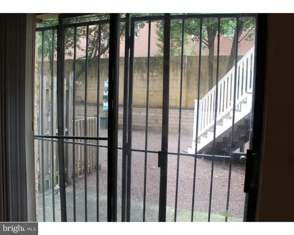 a black and white photo of a living room