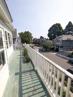 a view of balcony with seating space