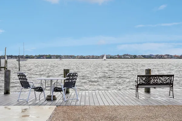a view of a terrace with chairs