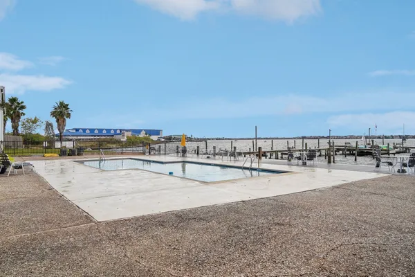 a view of a swimming pool and an outdoor space