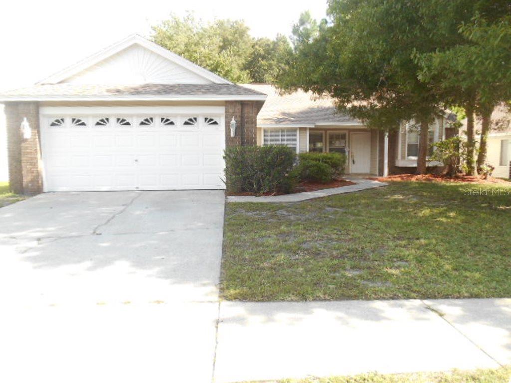 7818 Grimsby Lane New Port Richey, FL 34655 - Photo 1 of 1 a view of house with yard
