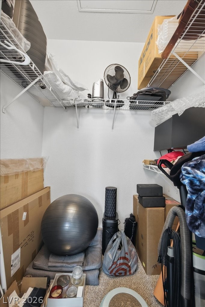 10550 West Alexander Road, Unit 2164 Las Vegas, NV 89129 - Photo 23 of 27 Storage solutions abound in this practical, well-organized closet space.
