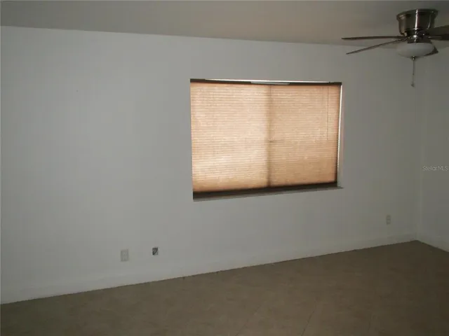 an empty room with a window