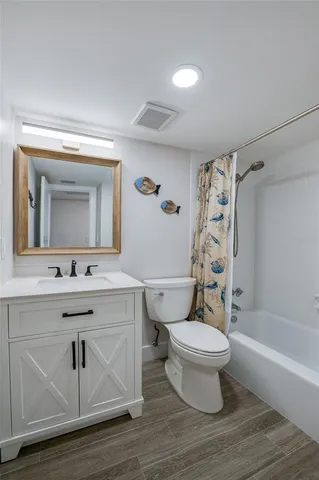 a view of a chair and table in a balcony