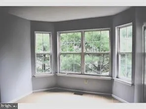 a living room with a large window