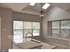 a black and white photo of a living room