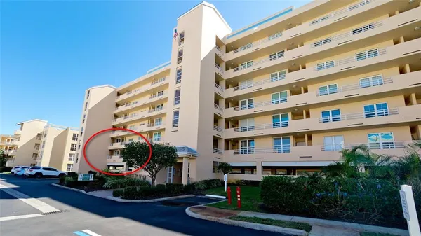 a view of a patio with couches table and chairs