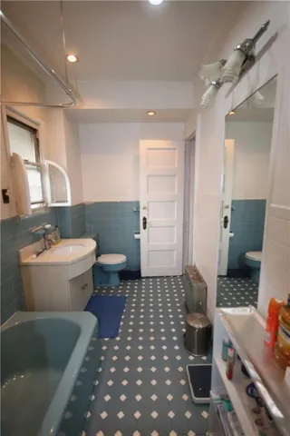 a view of entryway and hall with a window