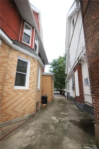 a view of a city street with cars