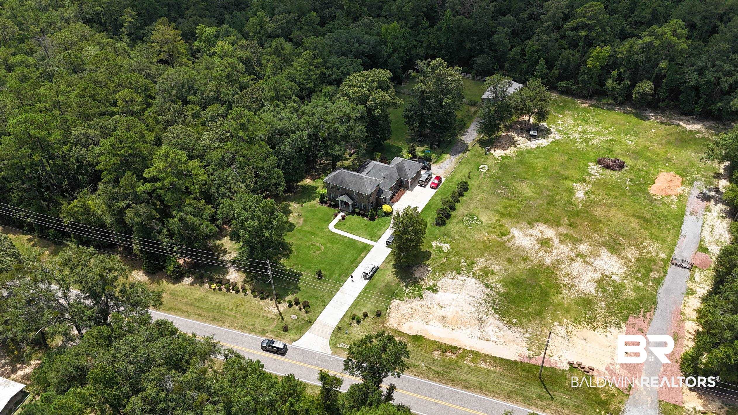9060 Bromley Road Bay Minette, AL 36507 - Photo 56 of 63 Bird's eye view of a heavily wooded area