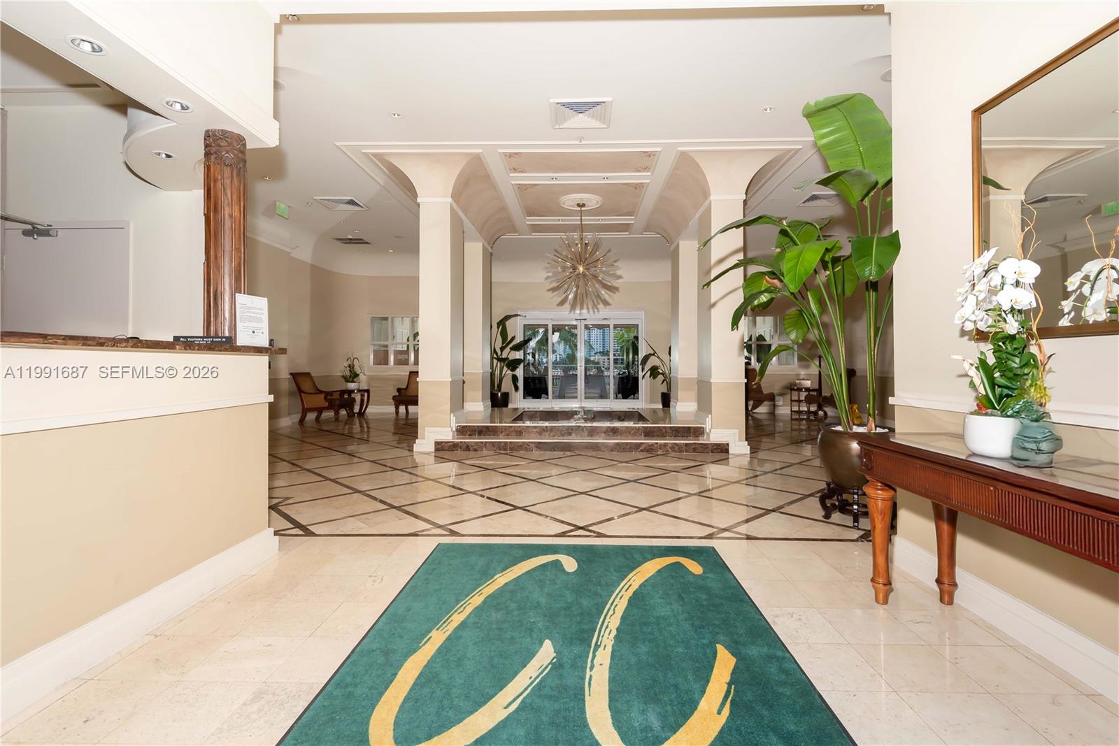 701 Brickell Key Boulevard, Unit 1912 Miami, FL 33131 - Photo 50 of 67 a living room with furniture