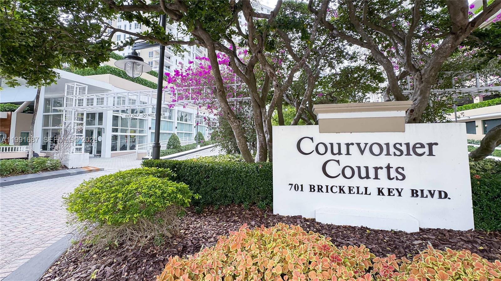 701 Brickell Key Boulevard, Unit 1912 Miami, FL 33131 - Photo 63 of 67 a sign on the side of the road