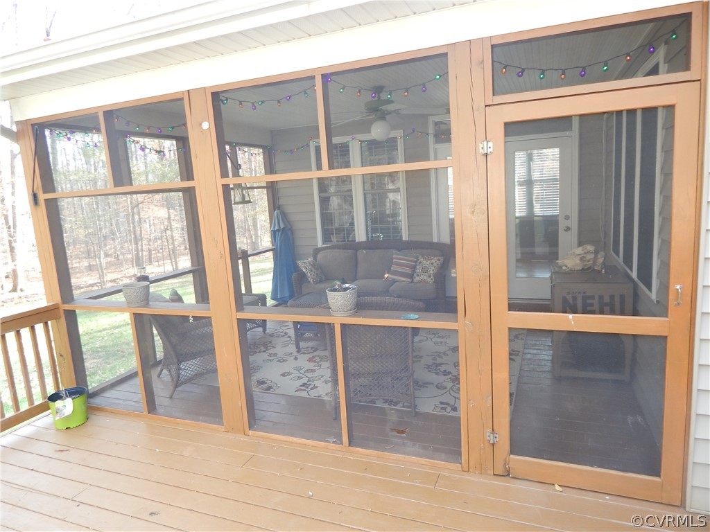 1389 Palmore Road Powhatan, VA 23139 - Photo 14 of 38 Screened Porch to relax in.