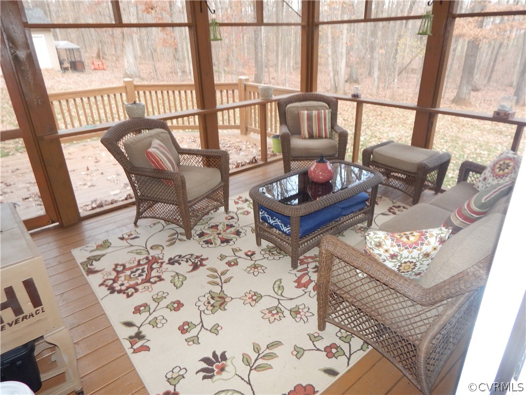 1389 Palmore Road Powhatan, VA 23139 - Photo 15 of 38 Screened Porch to relax!