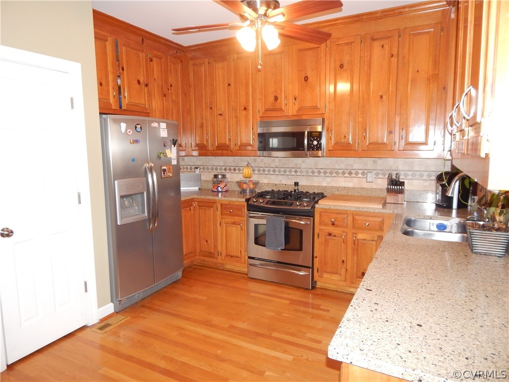 1389 Palmore Road Powhatan, VA 23139 - Photo 19 of 38 Hardwood and solid surface tops. Pantry too!!