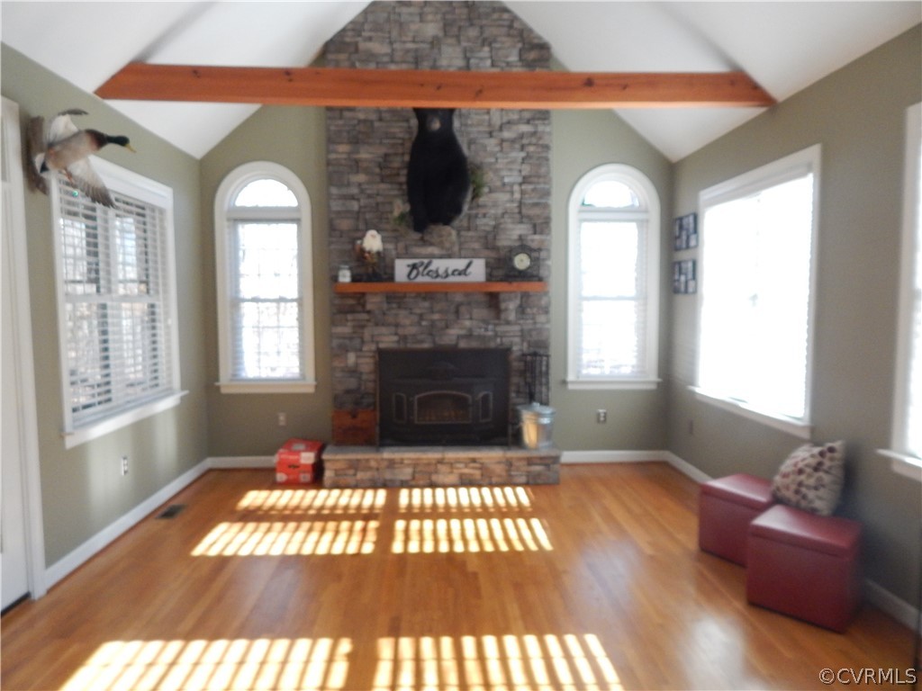 1389 Palmore Road Powhatan, VA 23139 - Photo 24 of 38 Sun Room or Family Room. Stone fireplace with Wood