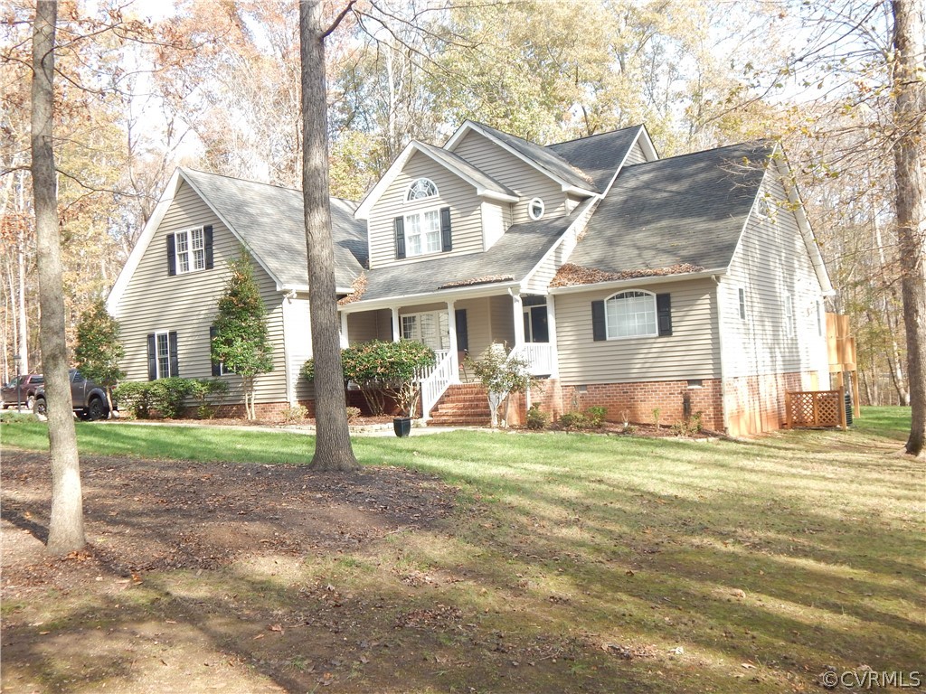 1389 Palmore Road Powhatan, VA 23139 - Photo 3 of 38 Nice home with paved drive and large yard.
