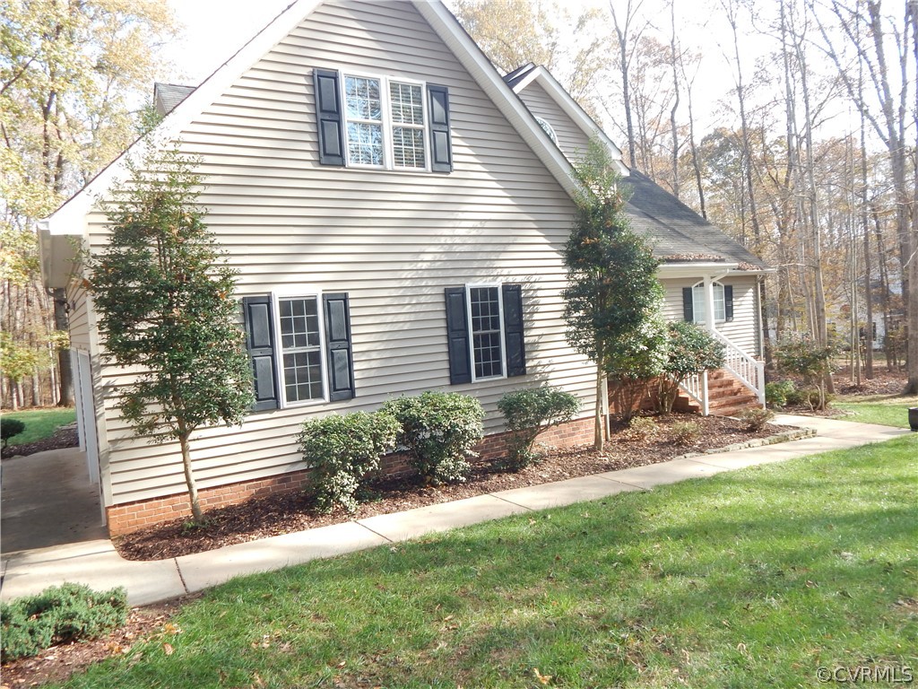 1389 Palmore Road Powhatan, VA 23139 - Photo 5 of 38 Sidewalk leading from parking area.