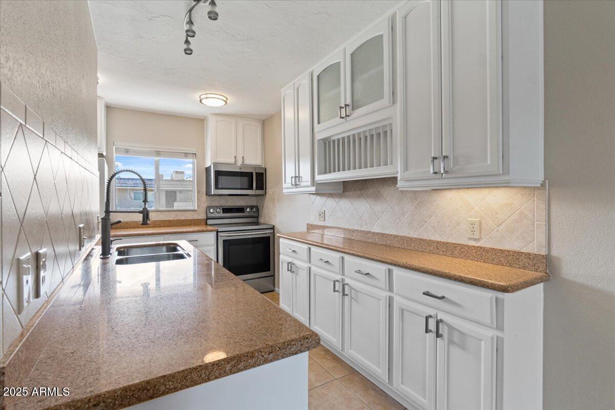 7430 East Chaparral Road, Unit A239 Scottsdale, AZ 85250 - Photo 2 of 28 09-Kitchen