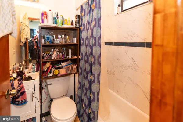 a view of a hallway with staircase