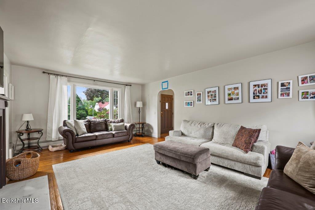 33 Eleanor Road Pittsfield, MA 01201 - Photo 7 of 45 a living room with furniture and a couch