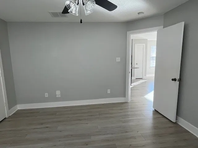 a view of livingroom with wooden floor