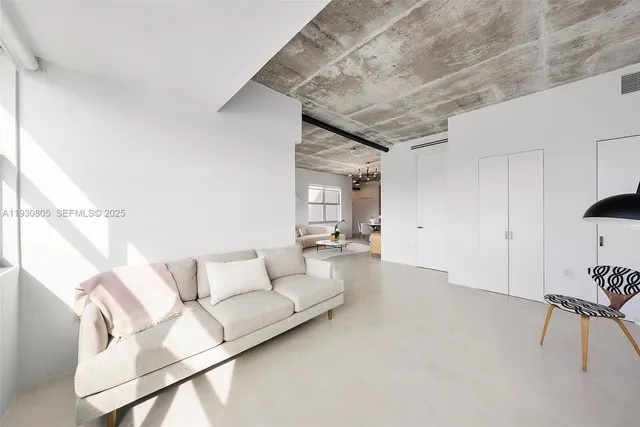 a living room with furniture and a couch