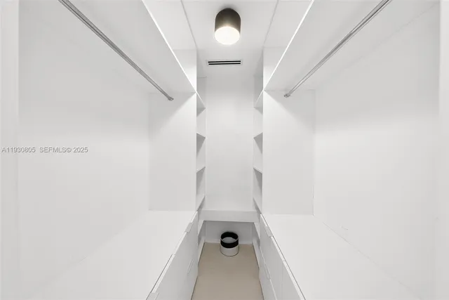 a view of a livingroom with furniture and a fireplace