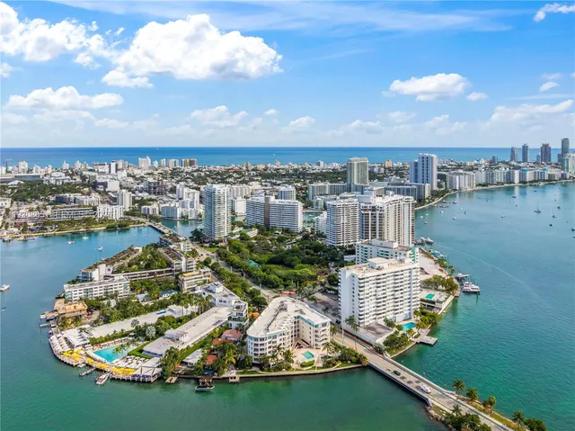 a view of a lake with sitting area
