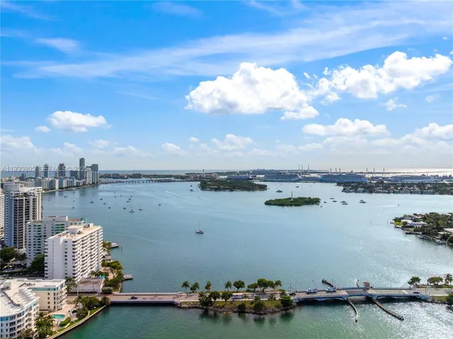 a view of a city and lake