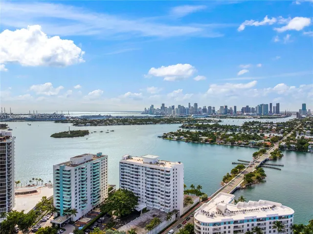 a view of a city and lake