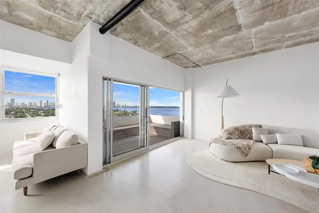 a spacious bedroom with a bed and walk in closet