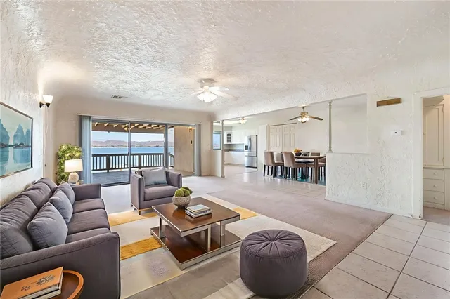 a living room with furniture and a table