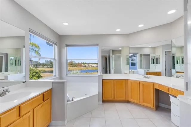 a large kitchen with a large window